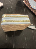 Small tan and blue wallet